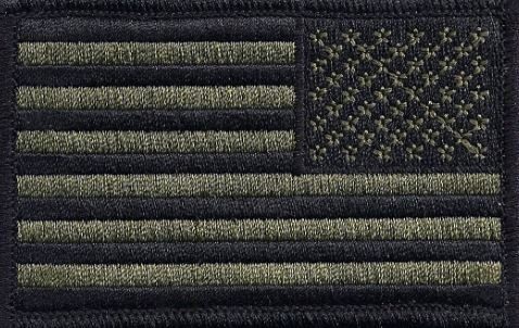 A black and green American flag patch with stars and stripes.